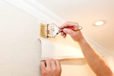 Pose de papier peint à la Versanne — revêtements muraux et toiles de verre